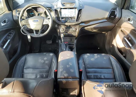 2017 Ford Escape Titanium z USA, uszkodzony, nr VIN 1FMCU9J9XHUB94829